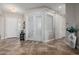 Bright and spacious entryway with tile flooring and French doors at 18211 W Sequoia Dr, Goodyear, AZ 85338