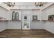 Large walk-in closet with ample shelving and mirror at 18211 W Sequoia Dr, Goodyear, AZ 85338