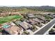 Aerial view showcasing homes near a golf course at 18211 W Sequoia Dr, Goodyear, AZ 85338