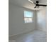 Spacious bedroom with large window and tile floors at 568 N Sirrine --, Mesa, AZ 85201