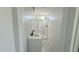 Clean bathroom, shower/tub combo, white vanity, tile floor at 568 N Sirrine --, Mesa, AZ 85201
