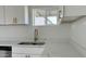 Modern kitchen sink with gold faucet and white quartz countertops at 568 N Sirrine --, Mesa, AZ 85201