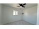 Simple bedroom with tiled floor and ceiling fan at 568 N Sirrine --, Mesa, AZ 85201