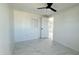 Bright bedroom with ceiling fan and tiled floor at 568 N Sirrine --, Mesa, AZ 85201