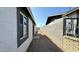 Long, narrow backyard with block wall and gravel at 568 N Sirrine --, Mesa, AZ 85201