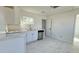 Modern kitchen with white cabinets and stainless steel appliances at 568 N Sirrine --, Mesa, AZ 85201