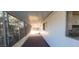 Enclosed patio with screens and carpet flooring at 120 N Val Vista Dr # 86, Mesa, AZ 85213