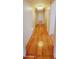 Long hallway with light wood flooring and access to bedrooms at 120 N Val Vista Dr # 86, Mesa, AZ 85213