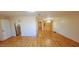 Bright and airy living room with hardwood floors and kitchen access at 120 N Val Vista Dr # 86, Mesa, AZ 85213