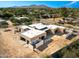 Aerial view of a contemporary home with mountain backdrop at 7501 E Palo Verde Dr # 8, Scottsdale, AZ 85250