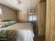 Bright bedroom with double bed and access to hallway at 1289 S Sioux Dr, Apache Junction, AZ 85119