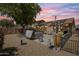 Relaxing backyard oasis with a hot tub and string lights at 16241 W Hearn Rd, Surprise, AZ 85379