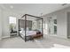 Spacious main bedroom with a four-poster bed and ensuite bathroom at 17871 E Paria Canyon Dr, Rio Verde, AZ 85263