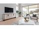 Living area with large TV, seating, and sliding doors at 17871 E Paria Canyon Dr, Rio Verde, AZ 85263