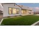 Landscaped backyard with artificial turf and a patio at 17871 E Paria Canyon Dr, Rio Verde, AZ 85263