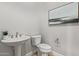 Modern powder room with pedestal sink and updated fixtures at 17871 E Paria Canyon Dr, Rio Verde, AZ 85263