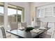 Elegant dining area with a dark wood table and built-in cabinetry at 17871 E Paria Canyon Dr, Rio Verde, AZ 85263