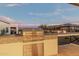 Outdoor kitchen with stainless steel grill and tile backsplash at 17871 E Paria Canyon Dr, Rio Verde, AZ 85263