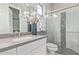 Modern bathroom with gray vanity, a large shower, and white toilet at 17871 E Paria Canyon Dr, Rio Verde, AZ 85263