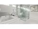 Spa-like bathroom with soaking tub, walk-in shower, and marble finishes at 17871 E Paria Canyon Dr, Rio Verde, AZ 85263