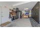 Organized garage with storage cabinets and workbench at 35532 N Sunset Trl, San Tan Valley, AZ 85140