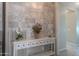 Entryway with a white console table and decorative wall tile at 35532 N Sunset Trl, San Tan Valley, AZ 85140