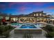 Modern home with pool, spa, and outdoor entertaining area at sunset at 9701 E Happy Valley Rd # 10, Scottsdale, AZ 85255