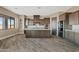 Modern kitchen with dark wood cabinets, granite countertops, and stainless steel appliances at 2526 W Fernwood Dr, Phoenix, AZ 85086