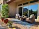 Relaxing patio with seating area and mountain views at 26627 N 104Th Way, Scottsdale, AZ 85262