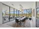 Modern dining area with a large table and chairs, offering scenic views at 37200 N Cave Creek Rd # 1017, Scottsdale, AZ 85262