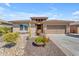 One-story home with desert landscaping, two-car garage, and attractive facade at 4556 W South Butte Rd, San Tan Valley, AZ 85144