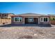 Newly built home with a large backyard and patio at 43856 N Hudson Trl, New River, AZ 85087