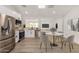 Modern kitchen with stainless steel appliances and white cabinets at 1036 E Grandview St, Mesa, AZ 85203