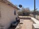 Brick patio, small yard with chain link fence at 8010 S Avenida Del Yaqui --, Guadalupe, AZ 85283