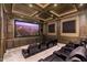 Luxurious home theater with large screen and comfortable seating at 6630 E Stallion Rd, Paradise Valley, AZ 85253