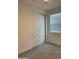Bright bedroom with double door closet and grey carpet at 5513 W San Gabriel Ave, Laveen, AZ 85339