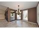 Bright dining room with large windows and elegant chandelier at 23014 N 86Th St, Scottsdale, AZ 85255