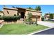 Spanish style home with landscaped lawn and two-car garage at 23014 N 86Th St, Scottsdale, AZ 85255