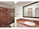 Bathroom with marble vanity and large walk-in shower at 23014 N 86Th St, Scottsdale, AZ 85255