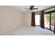 Bright bedroom with large windows and patio access at 23014 N 86Th St, Scottsdale, AZ 85255