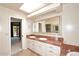 Bathroom with double vanity and marble countertops at 23014 N 86Th St, Scottsdale, AZ 85255