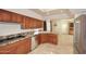 Modern kitchen with granite countertops and stainless steel appliances at 23014 N 86Th St, Scottsdale, AZ 85255