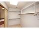 Large walk-in closet with ample shelving and hanging space at 23014 N 86Th St, Scottsdale, AZ 85255