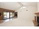 Living room with sliding doors leading to a patio at 23014 N 86Th St, Scottsdale, AZ 85255