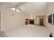 Bright living room with a fireplace and high ceilings at 23014 N 86Th St, Scottsdale, AZ 85255