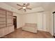 Home office with built-in shelving and en-suite bathroom at 23014 N 86Th St, Scottsdale, AZ 85255