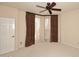 Well-lit bedroom with carpet flooring and large windows at 23014 N 86Th St, Scottsdale, AZ 85255