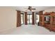 Spacious bedroom with patio access and built-in cabinet at 23014 N 86Th St, Scottsdale, AZ 85255