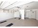 Spacious garage with built-in cabinets and shelving at 23014 N 86Th St, Scottsdale, AZ 85255