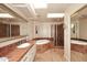 Spa-like bathroom with marble finishes and a soaking tub at 23014 N 86Th St, Scottsdale, AZ 85255